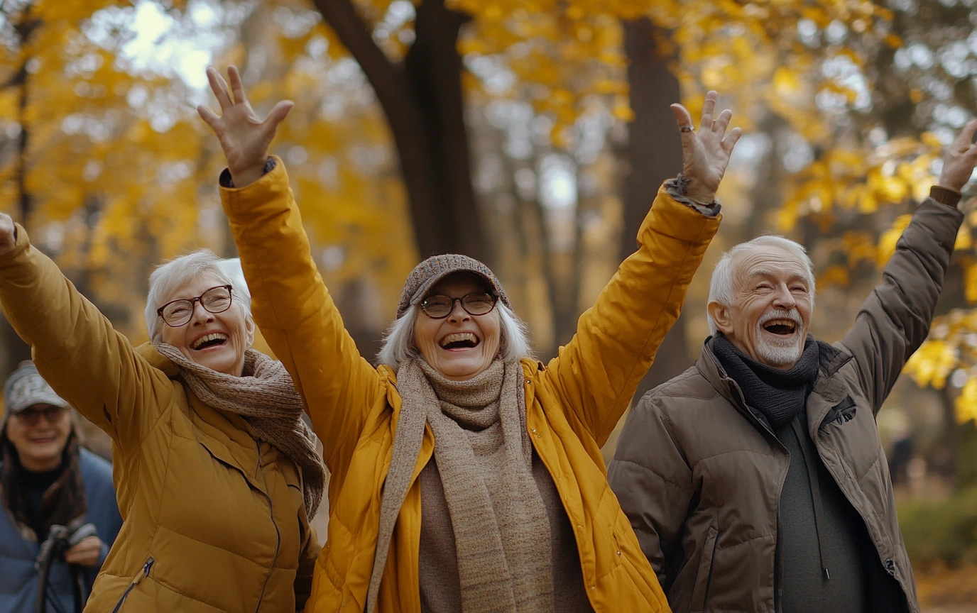 Щасливі активні пенсіонери займаються спортом на свіжому повітрі